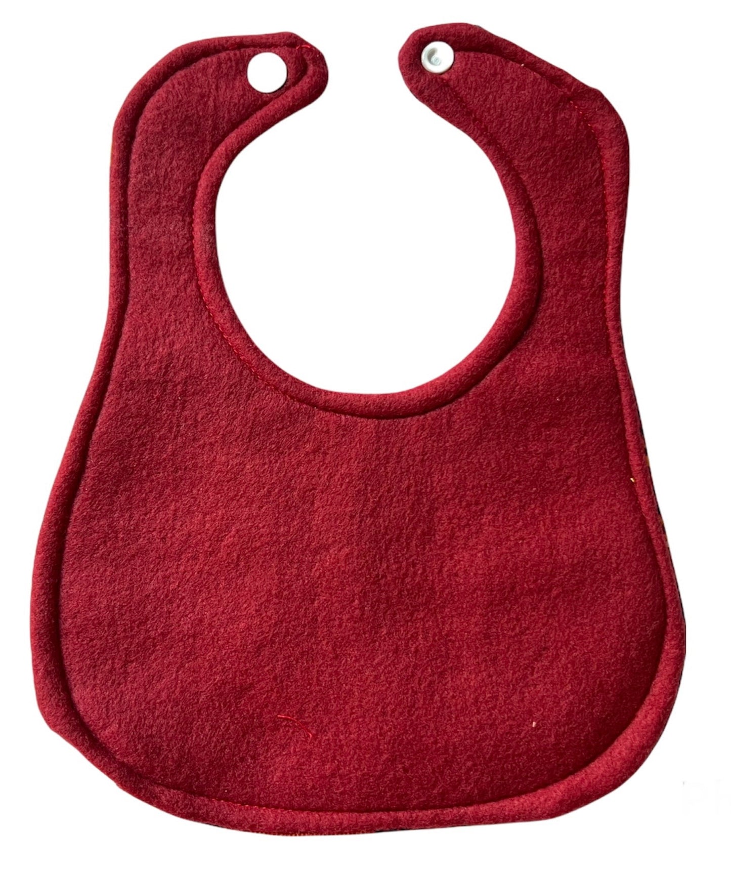 The back of kente print african baby bib, made of red fleece. Keywords include: african print baby bib, ankara print baby bib, handmade baby bib, best baby shower gift