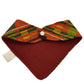 kente bandana baby bib. Keywords include: african print baby bib, ankara print baby bib, handmade baby bib, best baby shower gift  